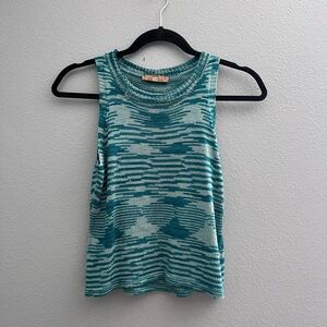 green knit top
